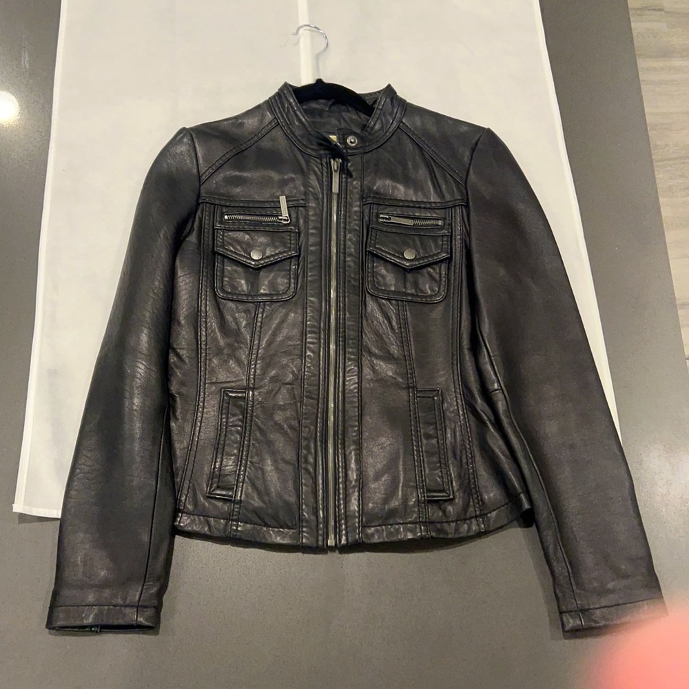 Black Xs small MICHAEL KORS GENUINE LEATHER JACKET .